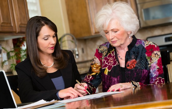 A Residential Real Estate Attorney discussing a home sale contract with a client