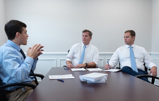 Business attorneys at Buxton & Collie discussing a deal for Mergers and Acquisitions in Charleston SC