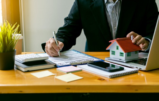 A Real Estate Transaction Attorney for Charleston County SC preparing sale documents